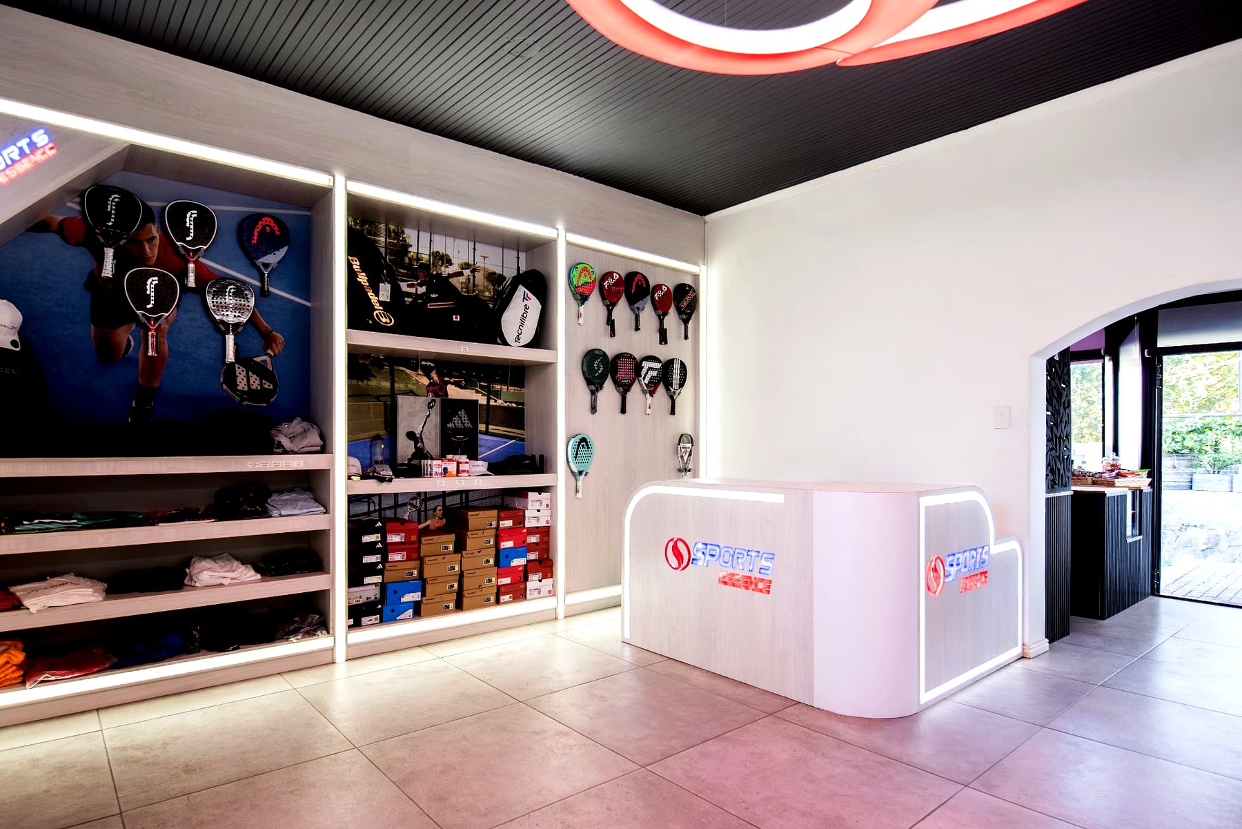 Pro shop with padel racquets and apparel